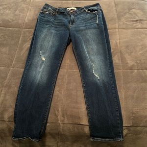 Slightly distressed, straight-legged blue jeans